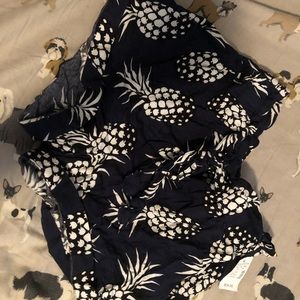 navy blue cinched waist shorts with pineapples
